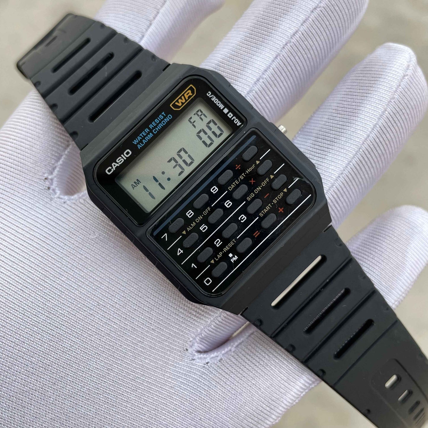 Casio CA-53W-1ZDR - 9 Digit Calculator Watch