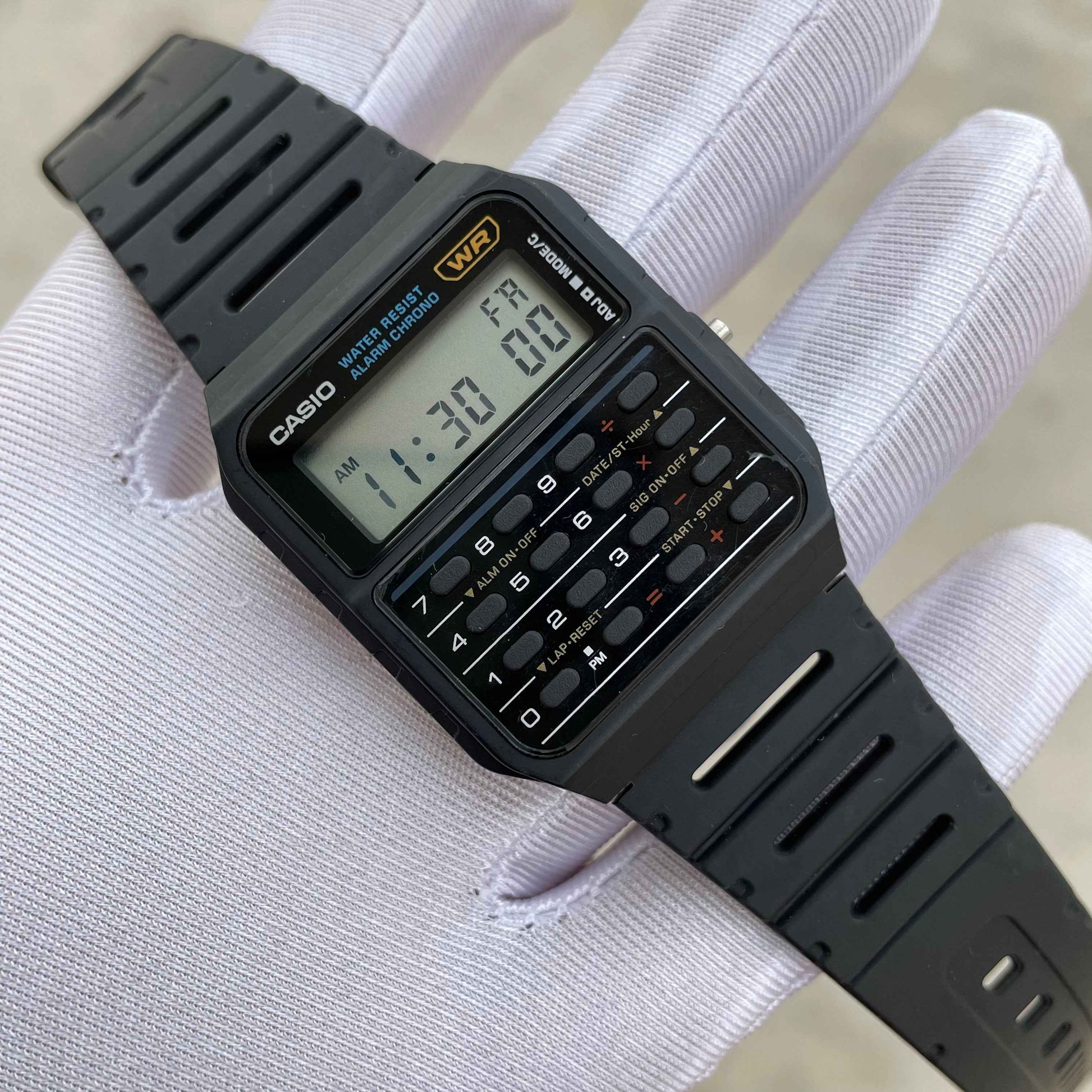 Casio CA-53W-1ZDR - 9 Digit Calculator Watch